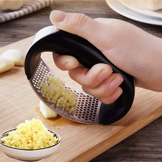 This is the world's best garlic press & masher from www.kitchenkazoo.com
